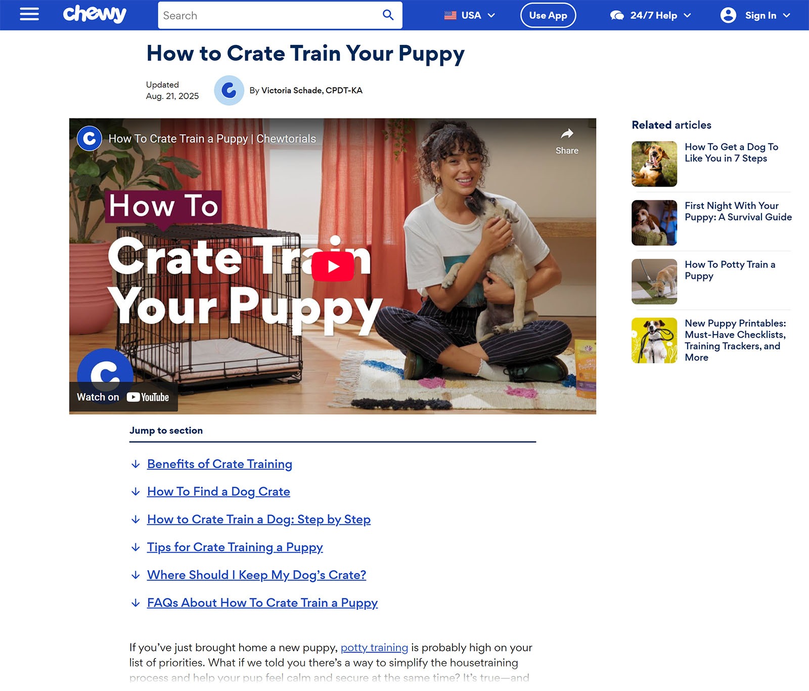 Chewy article showing a video under the title with a woman holding a puppy beside an open crate.
