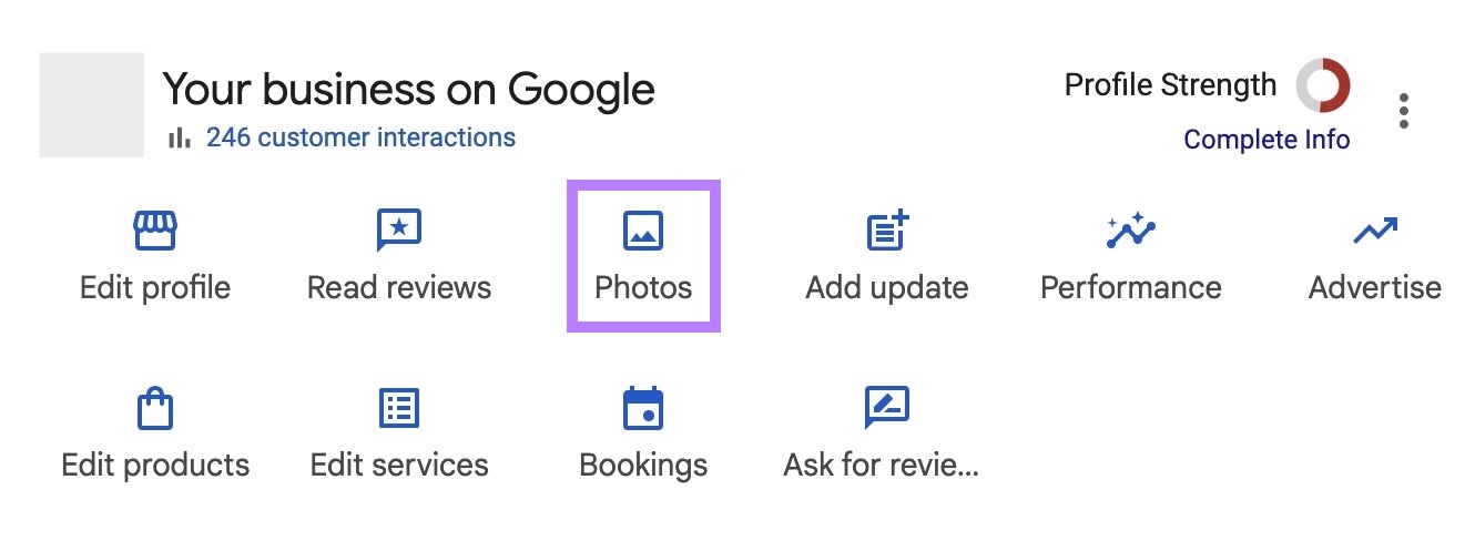 The "Photos" button highlighted on the Google Business Profile dashboard.